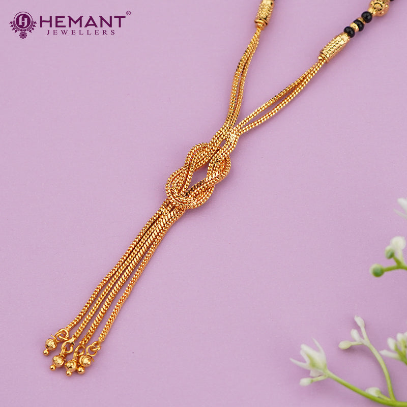 Elegant Gold-Plated Dual Chain Mangalsutra with Black Beads & Central Knot Tassel – 4294