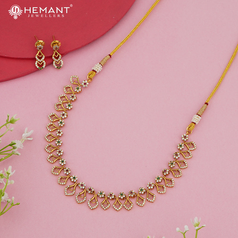 Antique-Finish Floral Diamond-Cut Necklace with Dual-Tone Petal Dangles – 4639