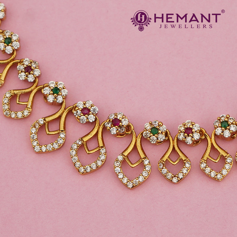 Antique-Finish Floral Diamond-Cut Necklace with Dual-Tone Petal Dangles – 4639