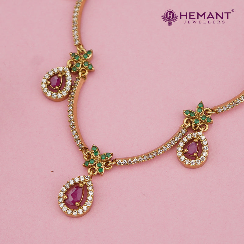 Antique-Finish Ruby Drop Necklace Set with Green Floral Accents – 4641