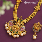 Traditional South Indian Gold-Tone Necklace/Haram Set with Goddess Lakshmi Pendant and Pearl Drops | 1