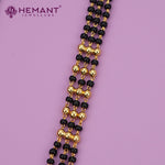 Gold-Plated Multi-Strand Mangalsutra with Wati/Vati Pendant – Black & Gold Beaded Design 4863-65