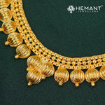 Ornate Gold Finish Long Necklace Set with Textured Bead Motifs and Stud Earrings - 5225